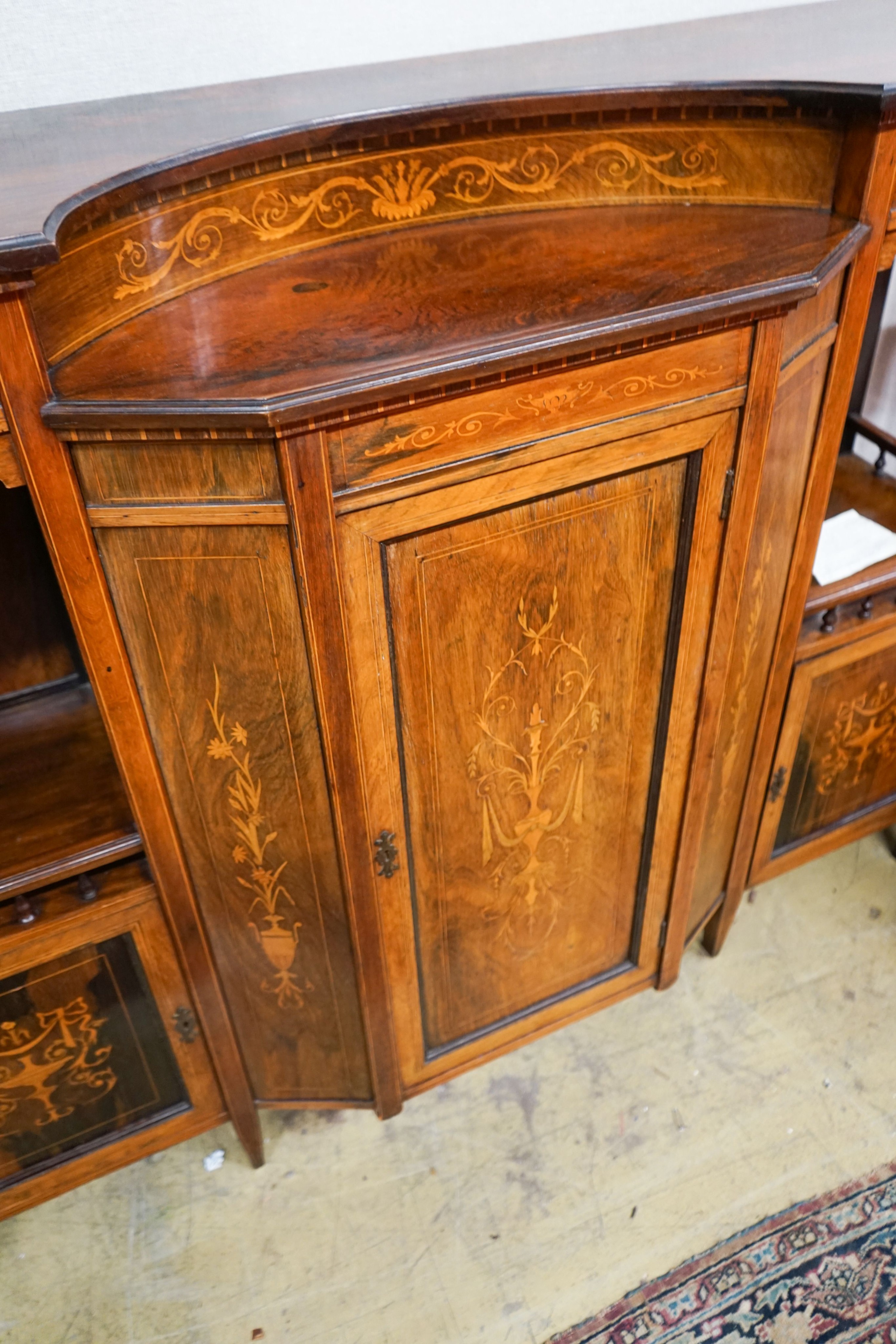 A late Victorian marquetry inlaid rosewood side cabinet, width 136cm, depth 39cm, height 104cm